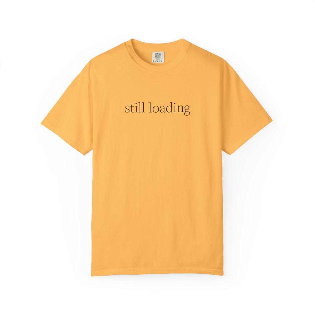 Yellow gold t-shirt with 'still loading' in black lettering