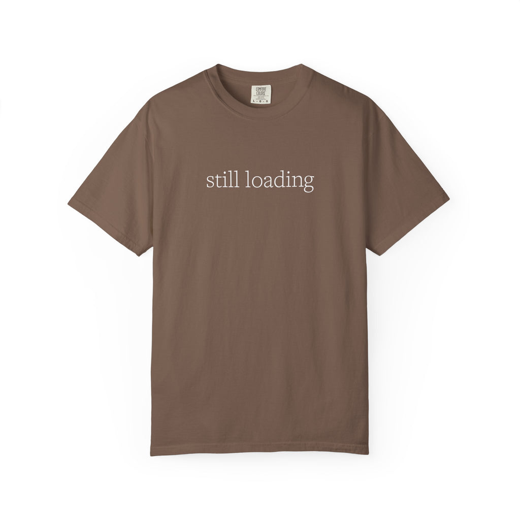 Brown t-shirt with 'still loading' text in white lettering