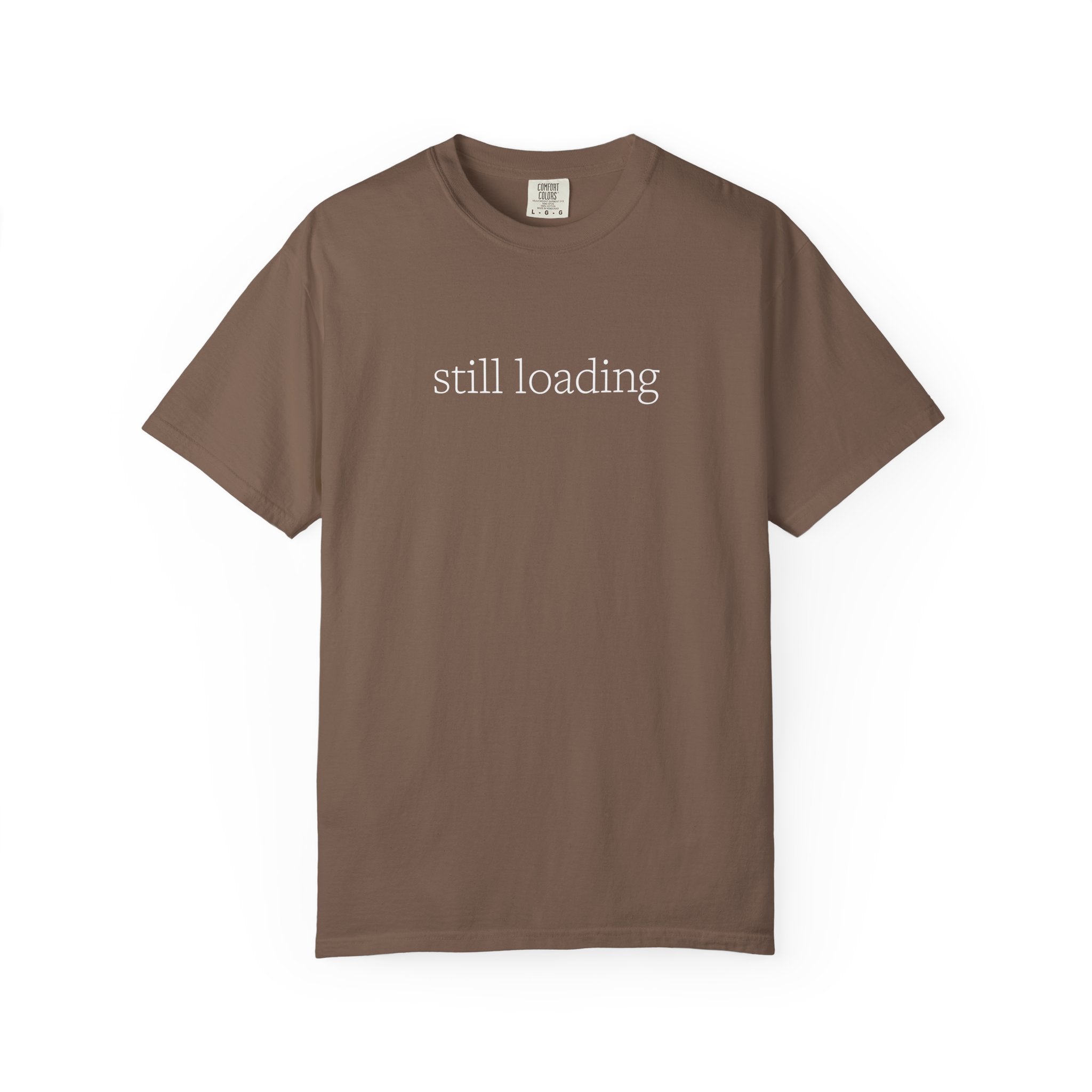 Brown t-shirt with 'still loading' text in white lettering