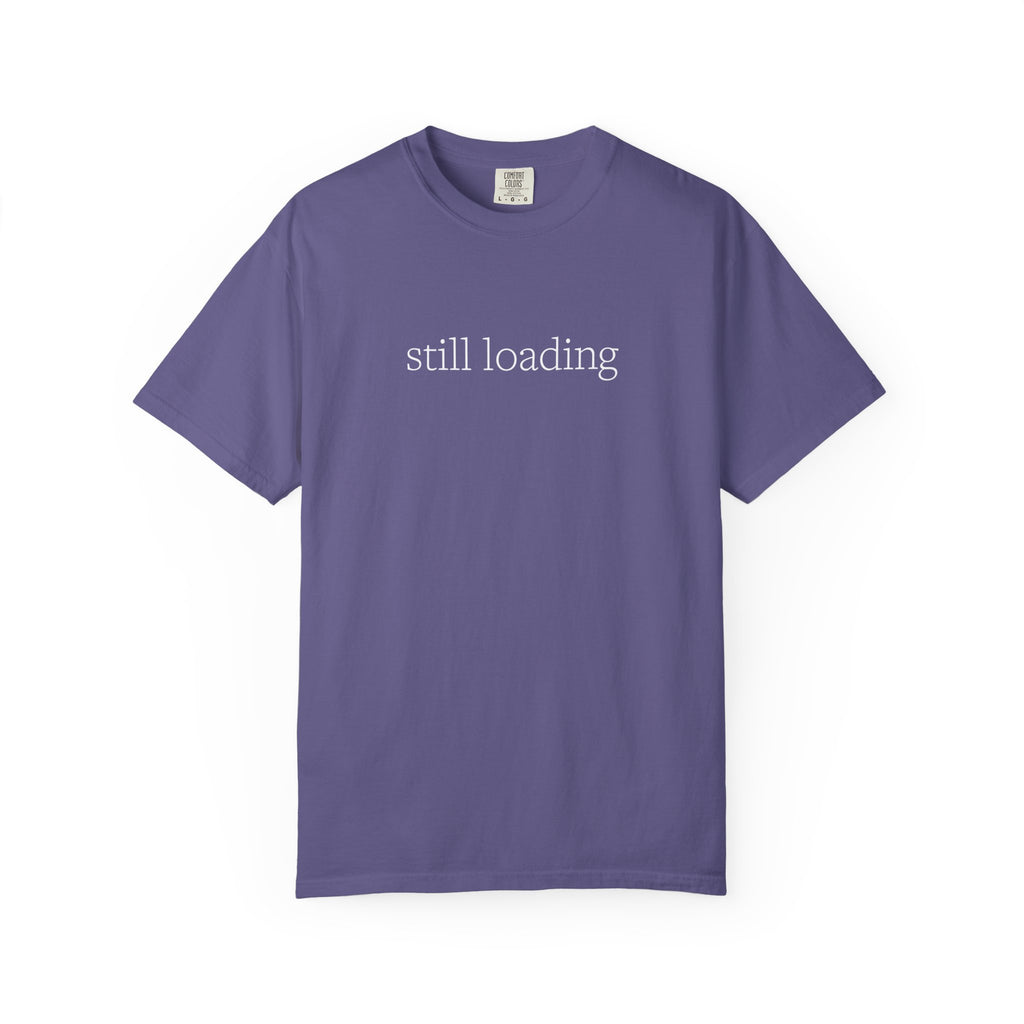 Purple t-shirt with 'still loading' text in white lettering
